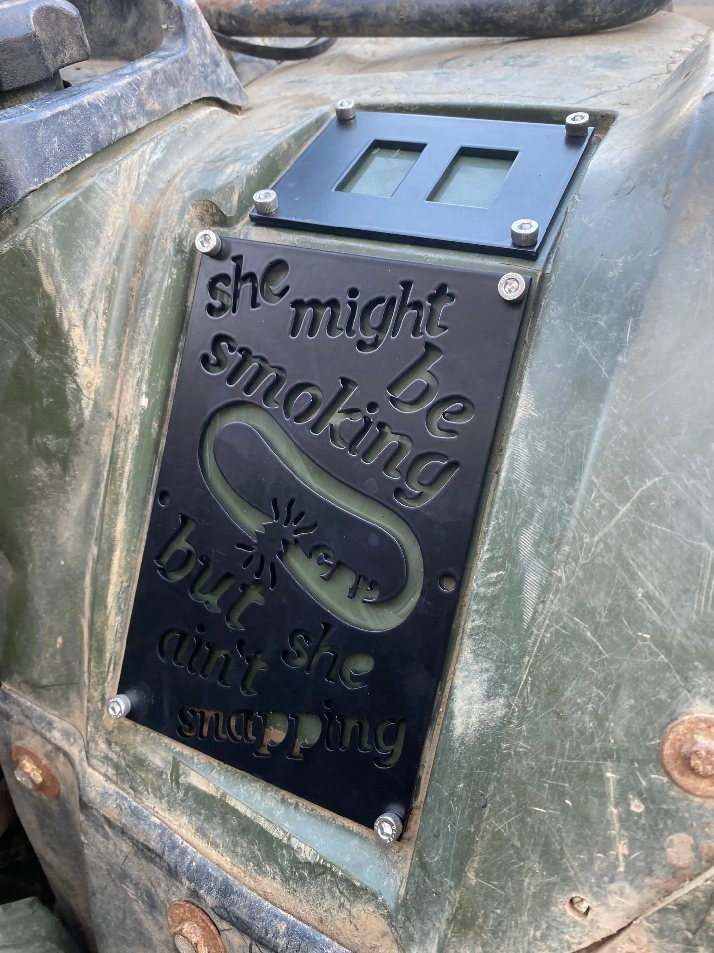 Black metal honda custom 3mm fender safety plate with engraved snake mounted on olive green vehicle