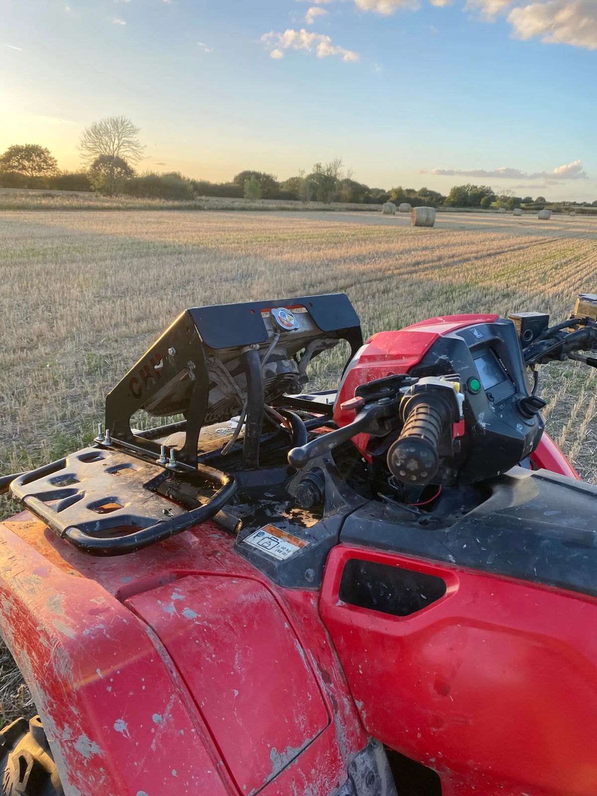 Red and black honda foreman 420 500 520 atv with heavy-duty radiator relocation kit and mounted camera system