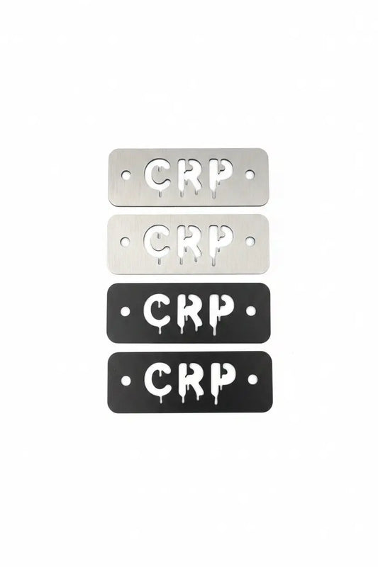 Silver and black metal flat footpegs with crp lettering and attachment holes for honda trx 420 500 520 2007–2026