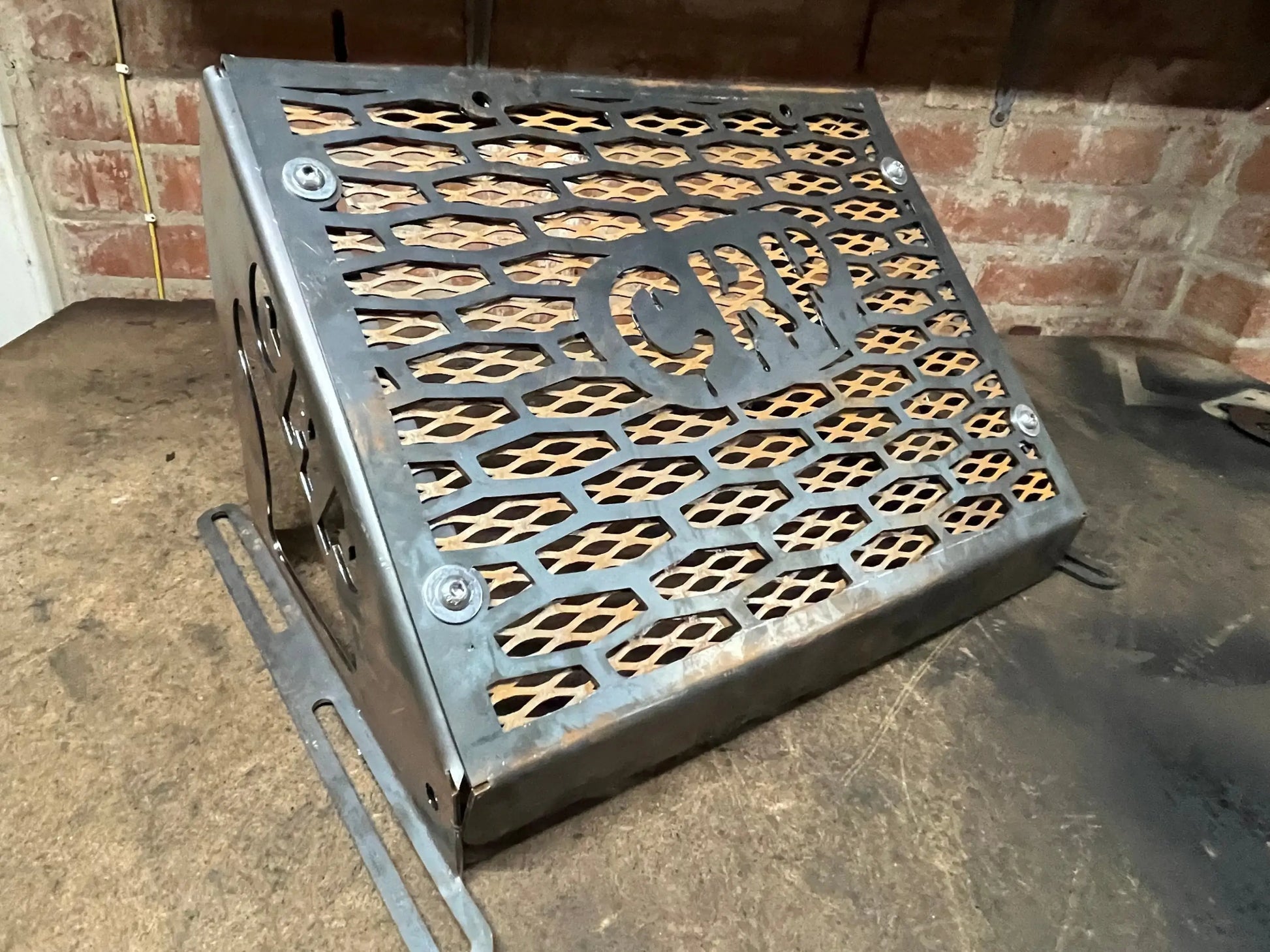 Black metal grill with honeycomb pattern and cwr cutout for kawasaki brute force 750 radiator relocation kit