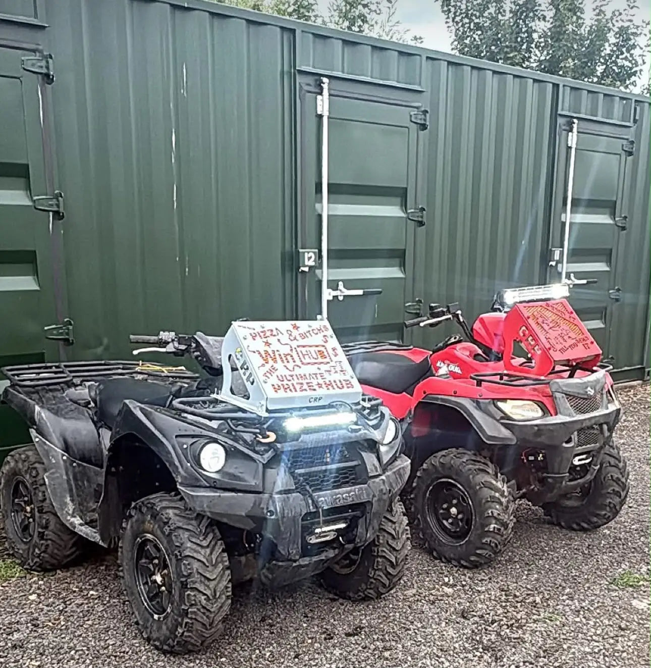 Black and red kawasaki brute force 750 atvs with heavy-duty radiator relocation kits carrying pizza boxes front-mounted