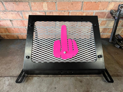 Black metal mesh panel with bright pink hand gesture cutout on heavy-duty radiator relocation kit for kawasaki brute force 750
