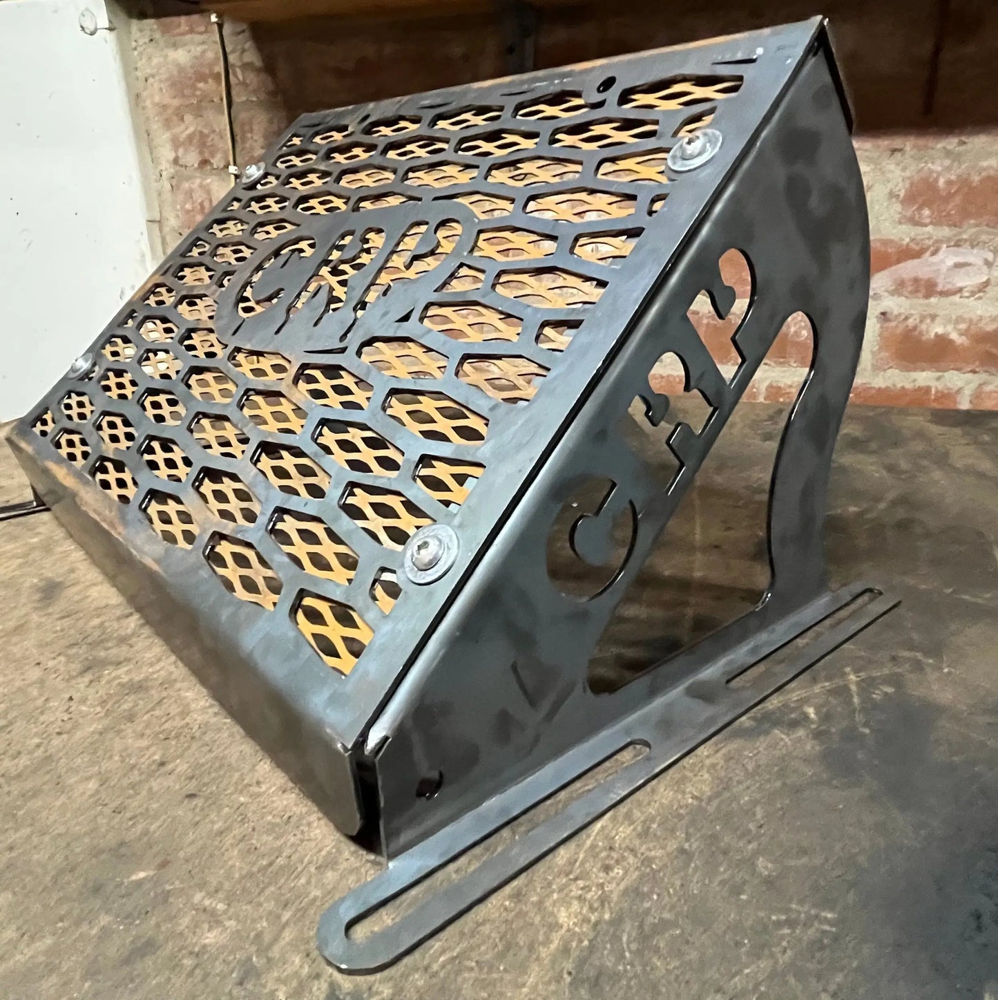 Black metal laptop stand with honeycomb lattice design and crf branding for kawasaki brute force 750 radiator kit