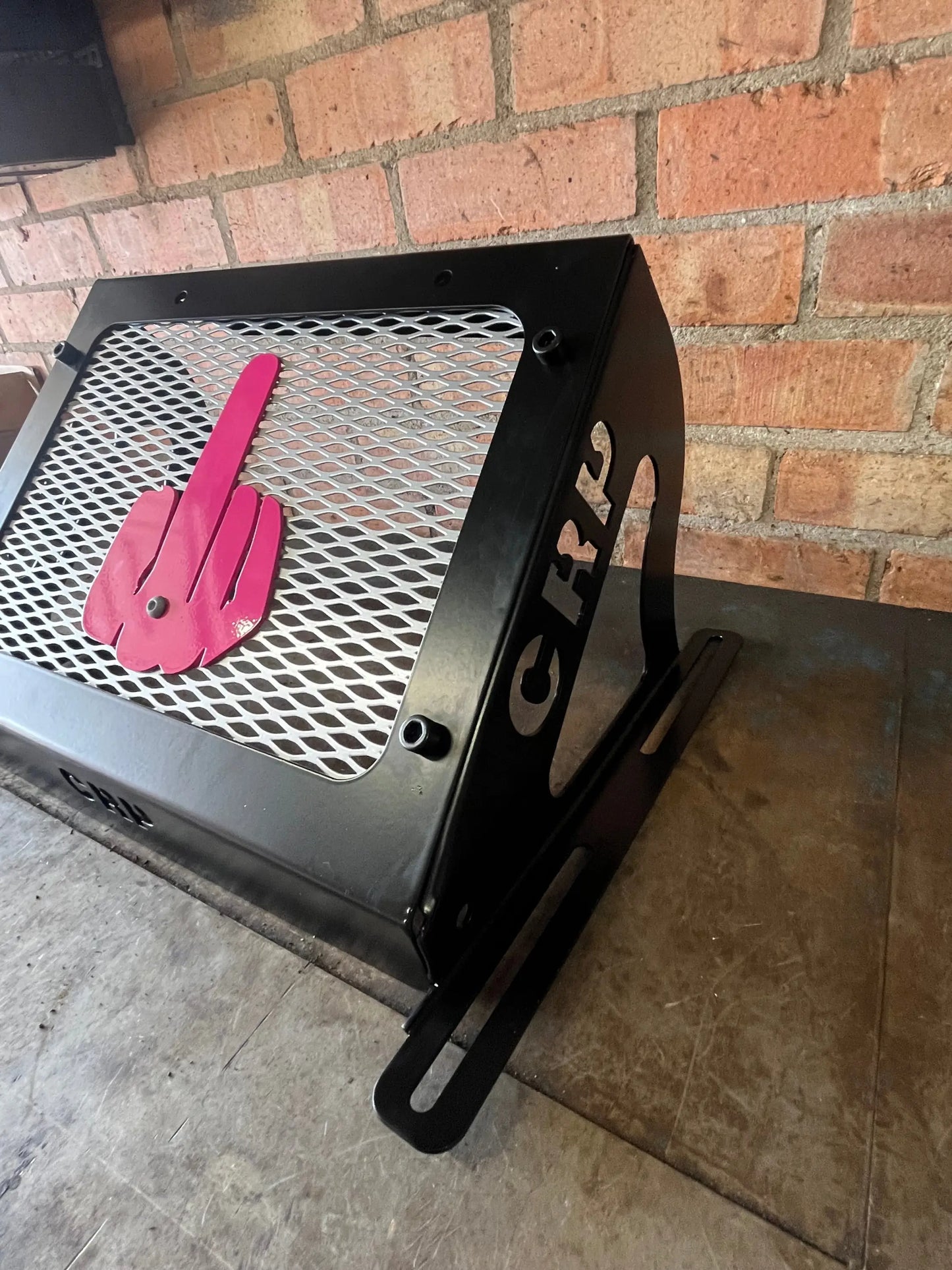 Black metal grill hood with pink finger gesture cutout and grs lettering for Kawasaki Brute Force 750 radiator kit