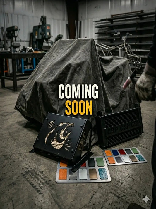 Black metal engine cover for Suzuki Kingquad EPS mount with gold-etched tiger logo and crp branding