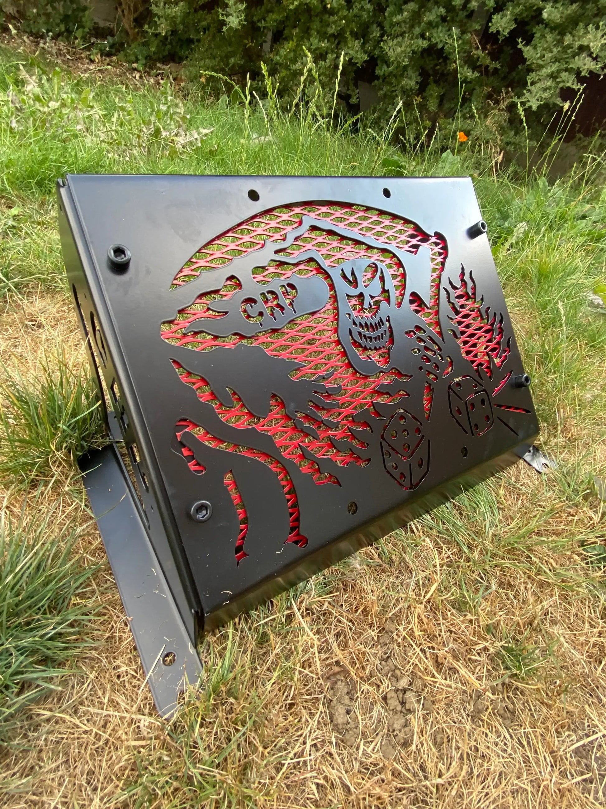 Black metal grill with red laser-cut skeleton and dice design for yamaha grizzly 550 700 heavy-duty radiator kit