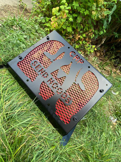 Black metal grill with red mesh insert and cut-out silhouette for yamaha grizzly 550 700 radiator relocation kit
