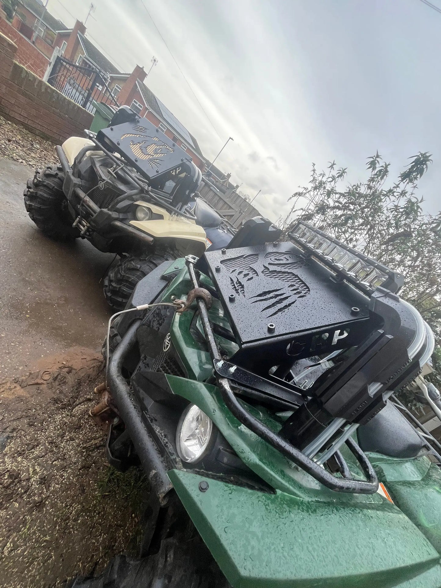 Green and black yamaha grizzly 550 700 off-road vehicle with rugged design and reinforced bumper featuring radiator relocation kit