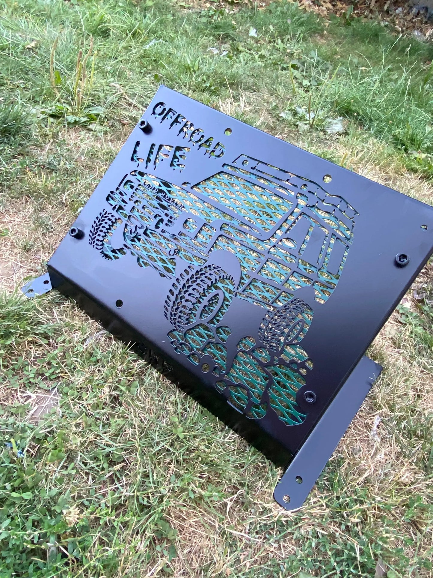 Black metal plaque with laser-cut off-road vehicle and offroad life engraving for Yamaha Grizzly radiator kit
