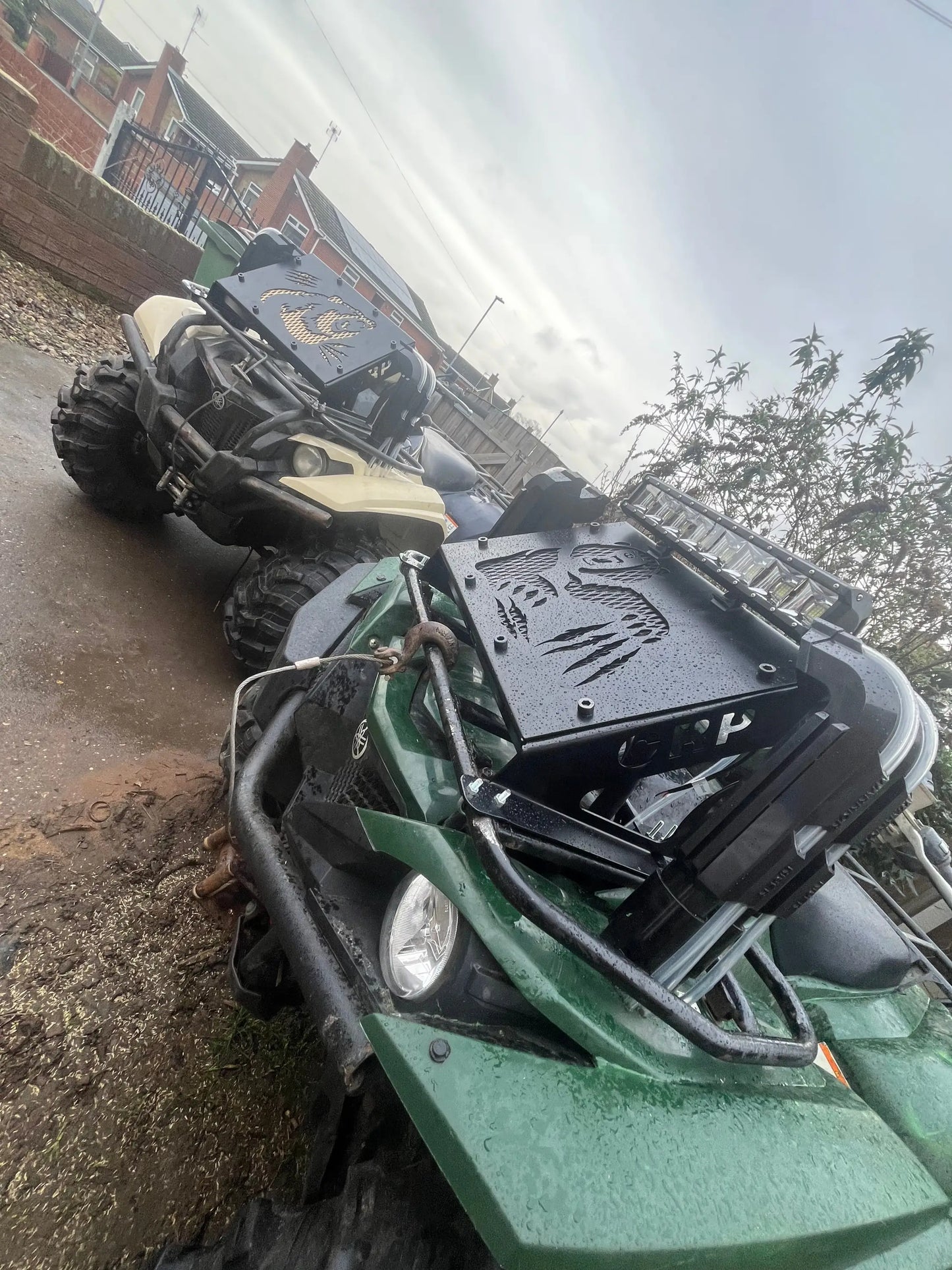 Green and black off-road Yamaha grizzly/kodiak 700 atv with rugged front bumper and radiator relocation kit skid plate